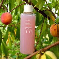 Tonique essence de p&ecirc;che illuminant Peach
