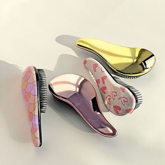 Mini brosse d&eacute;m&eacute;lante dor&eacute;