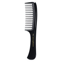 Peigne démêloir à manche en ébonite 1975