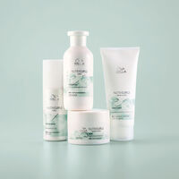 Baume de d&eacute;finition pour cheveux boucl&eacute;s Curlixir Nutricurls