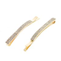 Barrettes dorées 2 rangées de strass x 2